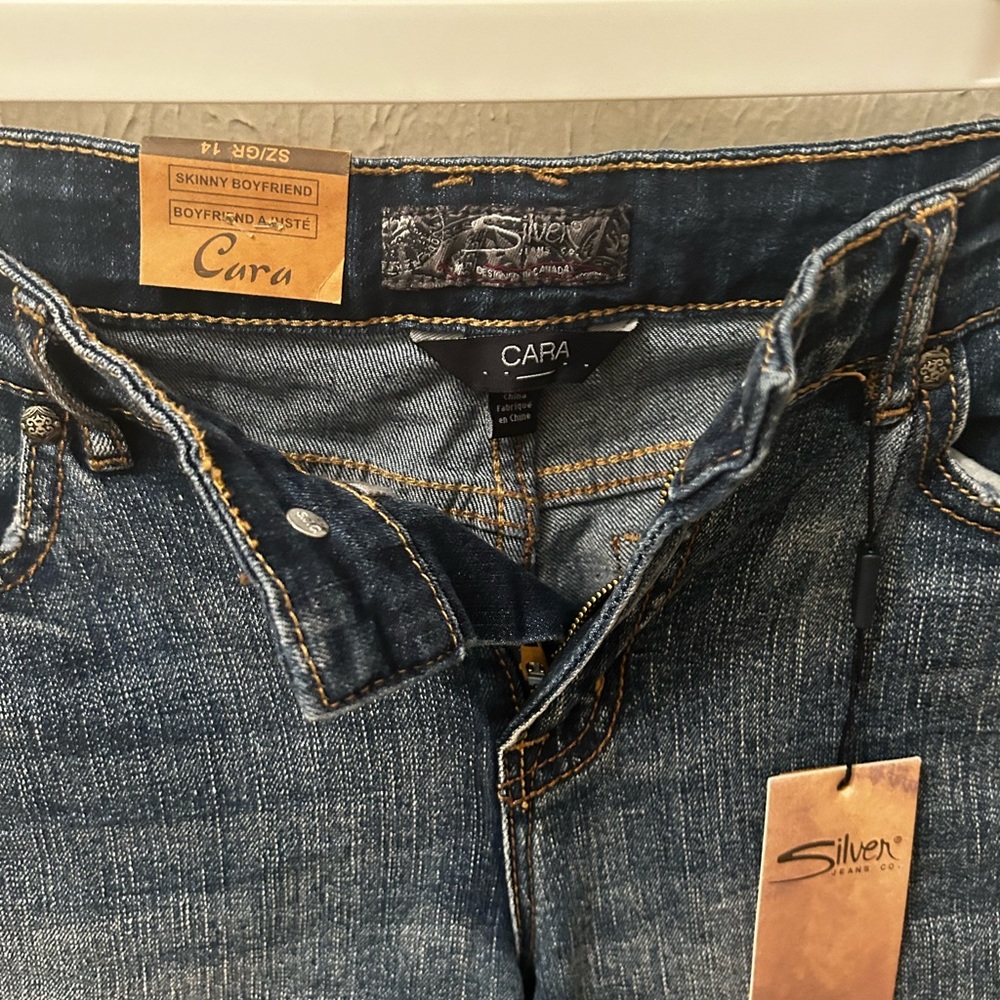 Girls size 14 jeans new with tags.